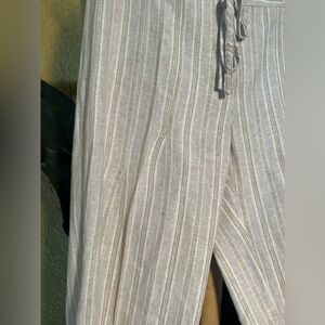 This pant is size 8, mixed material linen, cotton.